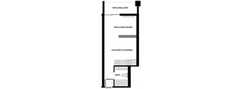a floor plan of a room with a bathroom and a bed