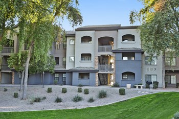Exterior Building with Lush Grass and Desert Landscaping Lazo Apartments Exterior Building with Lush Grass and Desert Landscaping - Photo Gallery 4