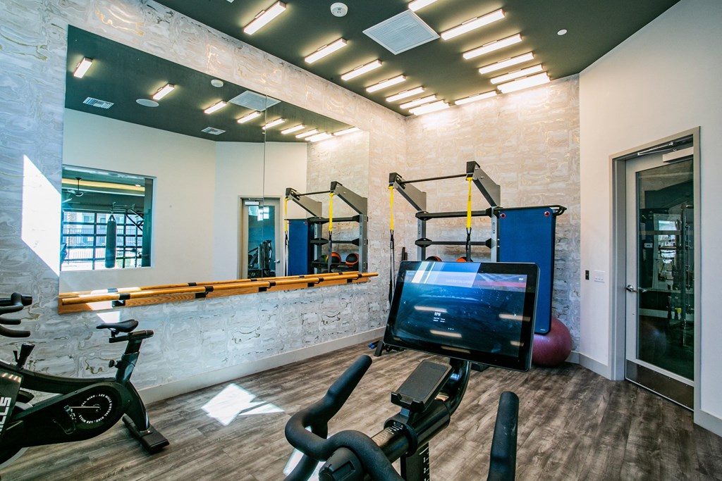 the gym at the flats at big tex apartments