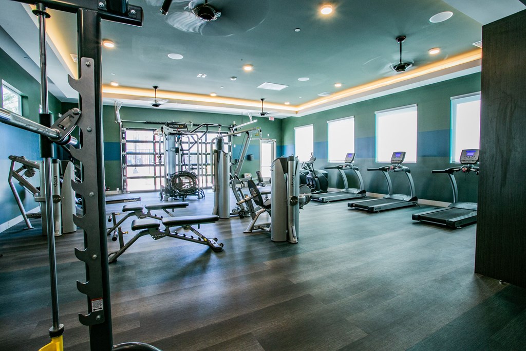 a gym with weights and other exercise equipment