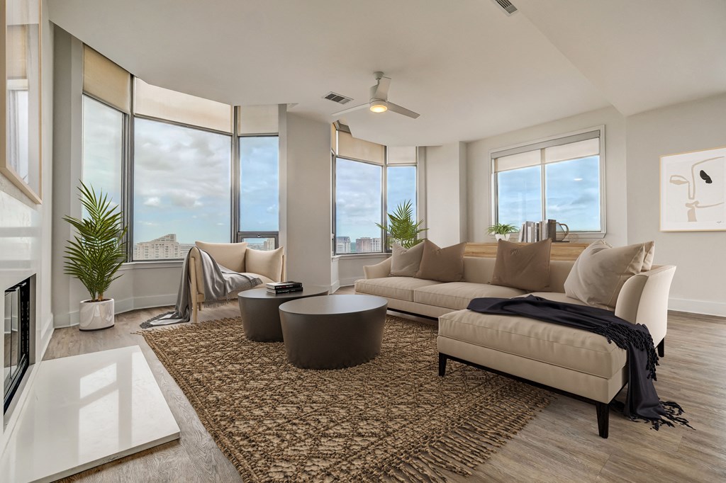 an open living room with a couch and a coffee table