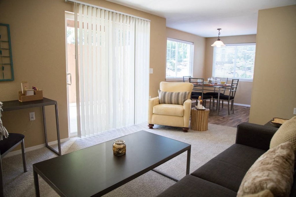 a living room with a couch and a table