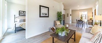 Franklin Flats Apartments Model Living Room and Dining Room with view of Bedroom - Photo Gallery 7