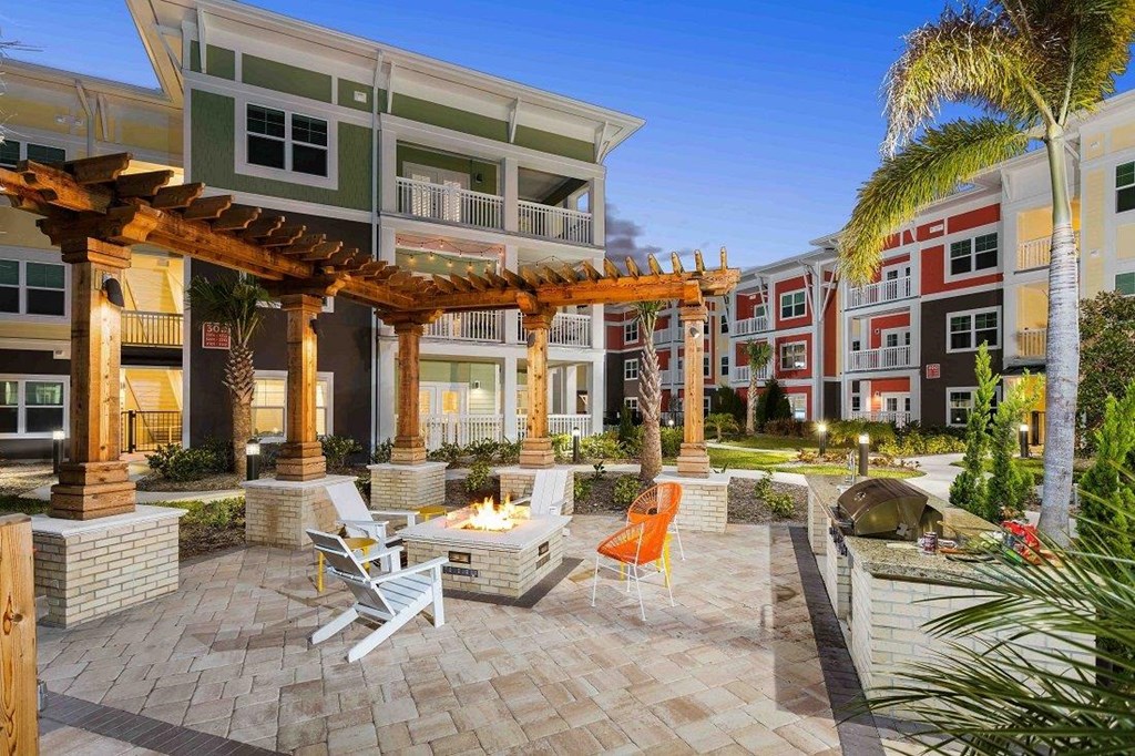 M South Apartments Patio with Firepit and BBQ Area