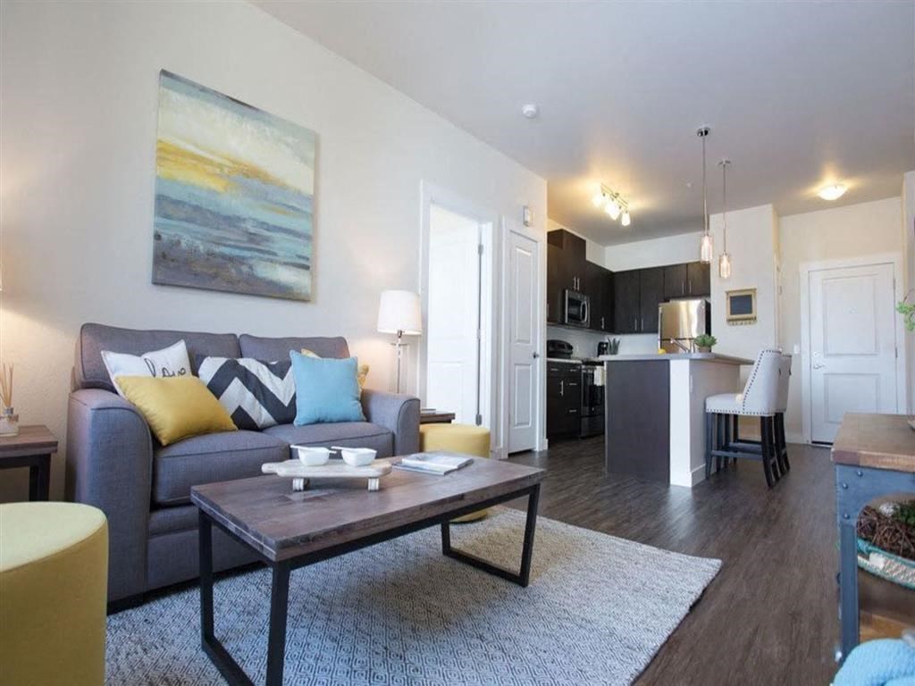 a living room with a couch and a table