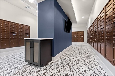 a locker room with wooden lockers and a television