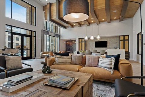 a living room with a large couch and a coffee table