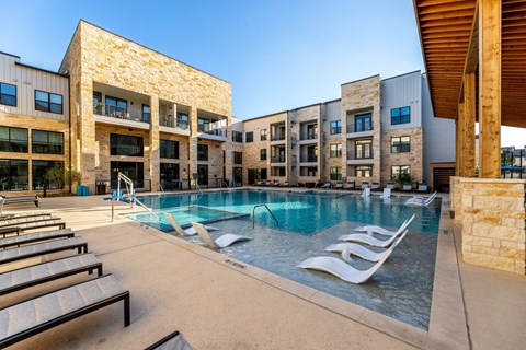 Maddox Hills Exterior and Pool with Lounge Chairs