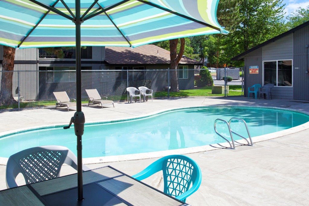 Maple Ridge Apartments Pool with Lounge Chairs