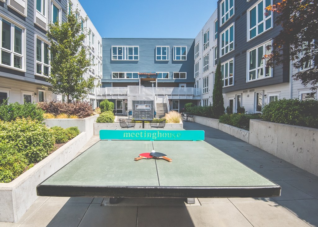 Meetinghouse Apartments Outdoor Courtyard and Ping Pong Table
