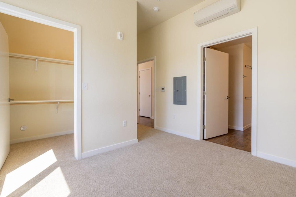 Meritage West Apartment Homes in Boise, Idaho Bedroom with Attached Walk-In Closet and Bathroom