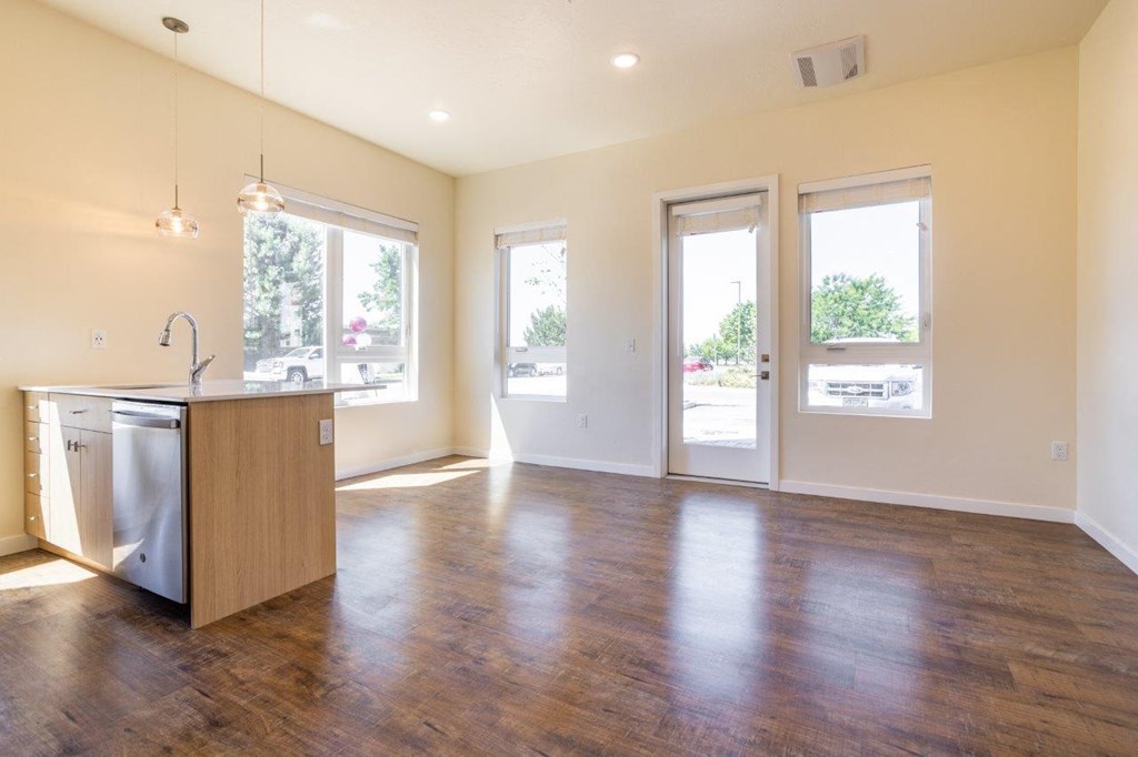 Meritage West Apartment Homes in Boise, Idaho Kitchen and Living Room with Large Windows