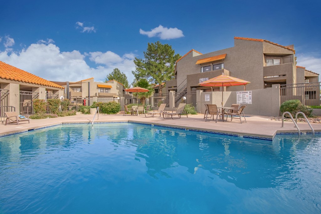 Metro on First Apartments in Tucson, Arizona Exterior and Pool with Lounge Chairs