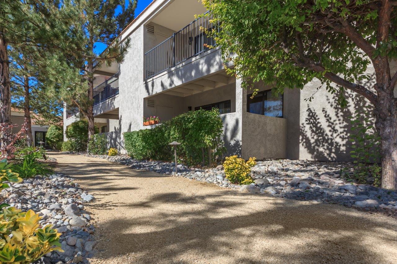 Sagecliff Apartments Shaded Walkway and Landscaping