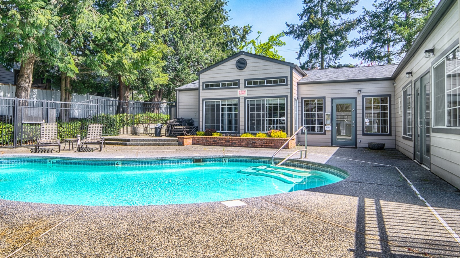 Novela Apartment Homes Shimmering Pool in Daytime