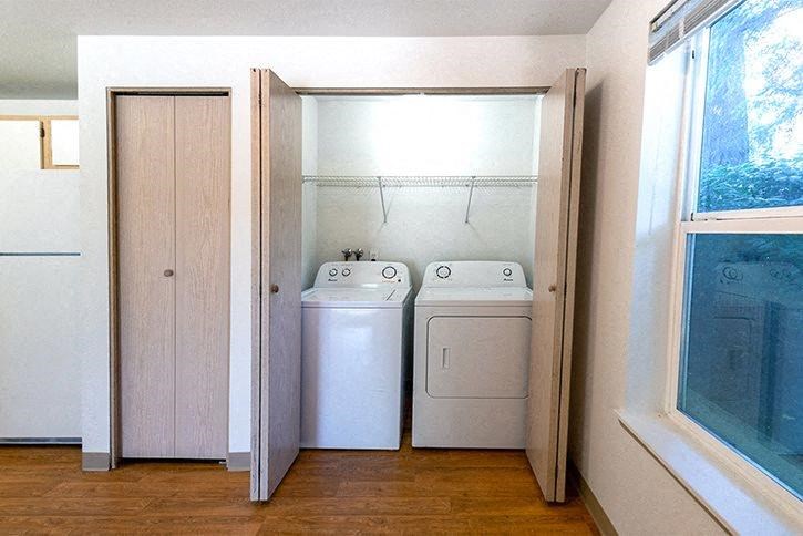 Reedville Commons interior laundry room with washer and dryer
