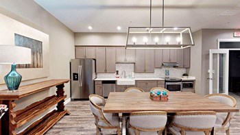Fruitland Meadow Clubhouse Kitchen with Dining Table Fruitland Meadow Clubhouse Kitchen with Dining Table - Photo Gallery 5