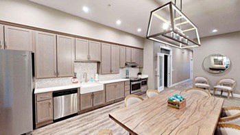Fruitland Meadow Clubhouse Kitchen with Dining Table Fruitland Meadow Clubhouse Kitchen with Dining Table - Photo Gallery 4
