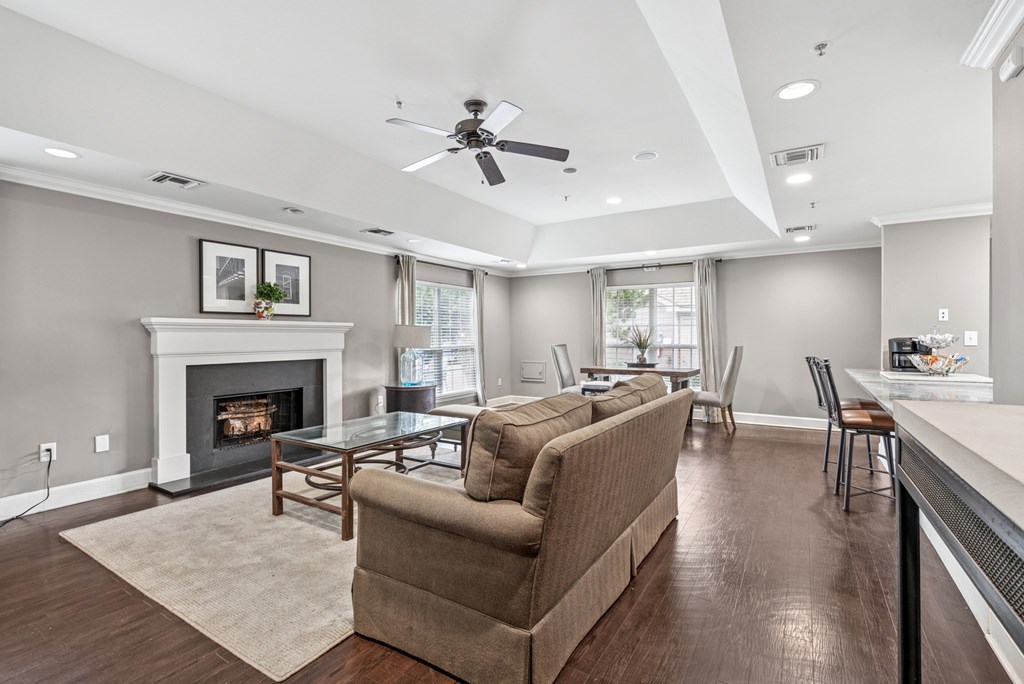 A living room with a fireplace and a couch.