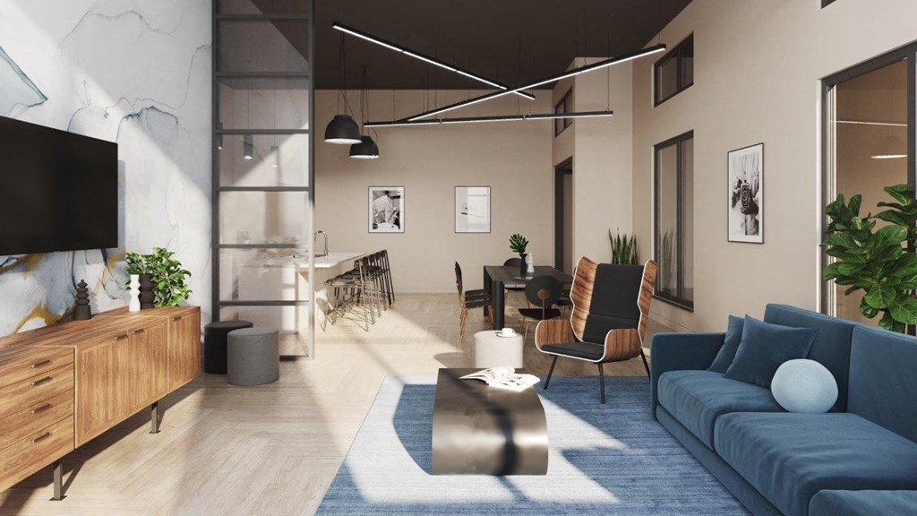 Adara SeaTac Apartments Street Level Clubroom with Seating and TV