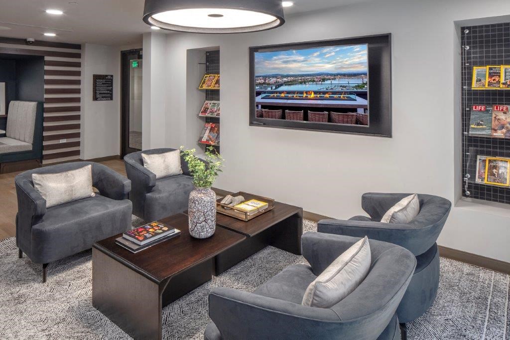 a living room with couches and a coffee table