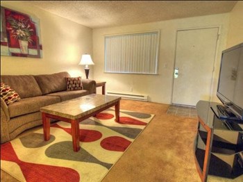 Wisteria Walk Apartments Model Living Room and Front Door Wisteria Walk Apartments Model Living Room and Front Door - Photo Gallery 4