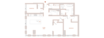 A floor plan of a house with two bedrooms, a living area, and a dining area.
