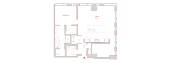 A floor plan of a house with a bedroom, living area, and a kitchen with a dining table and chairs.