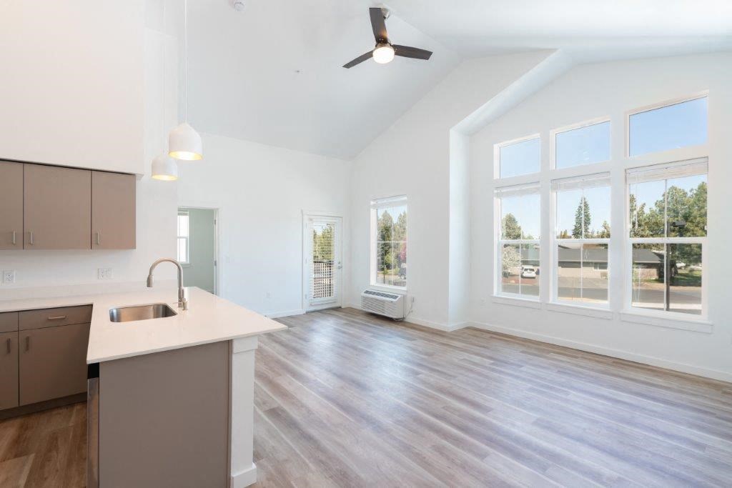 a living room with a geometric design on the floor