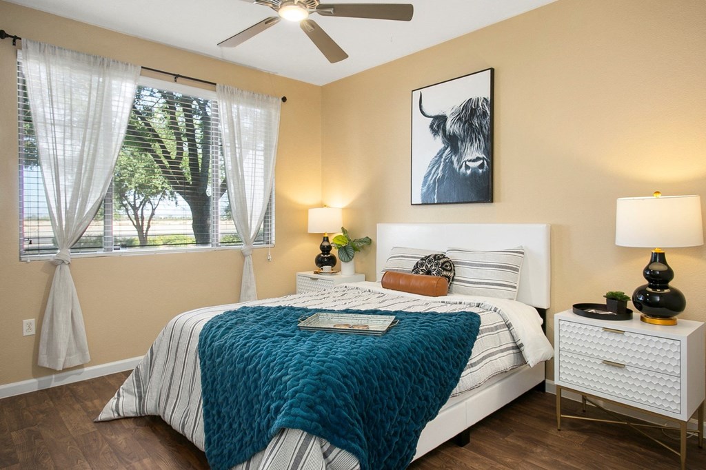 Painted Trails Bedroom with Hardwood Floors