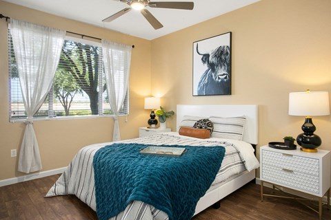 Painted Trails Bedroom with Hardwood Floors