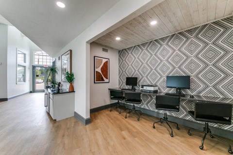 the preserve at ballantyne commons cyber office space with desks and chairs