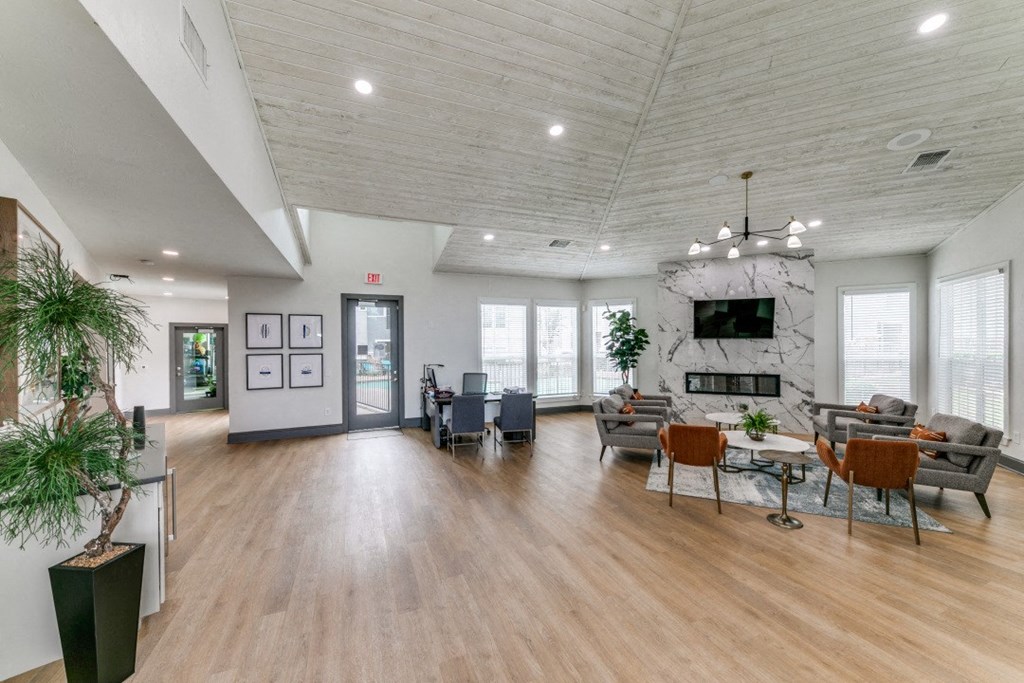 the preserve at ballantyne commons living room with furniture and a fireplace