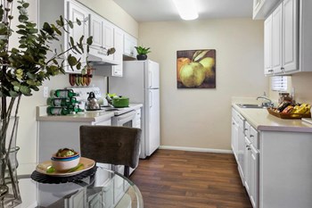 Palm Crest at Station 40 Model Dining Area and Kitchen - Photo Gallery 11