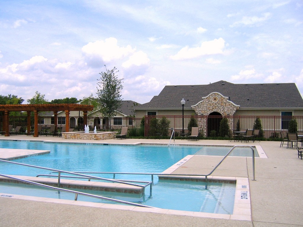 The Positano Apartments Building Exterior and Pool Area