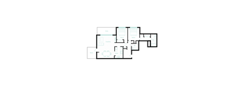 A floor plan of a house with a garage and a separate studio.