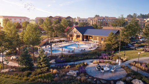 A community pool surrounded by a landscaped area with a pavilion in the background.