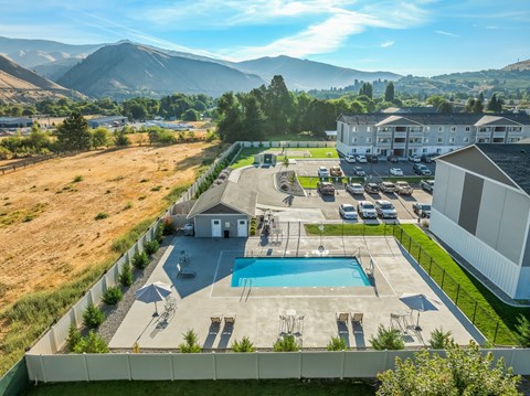 Aerial view of resort style pool and patio area at Pioneer Apartments, Washington, 98815
