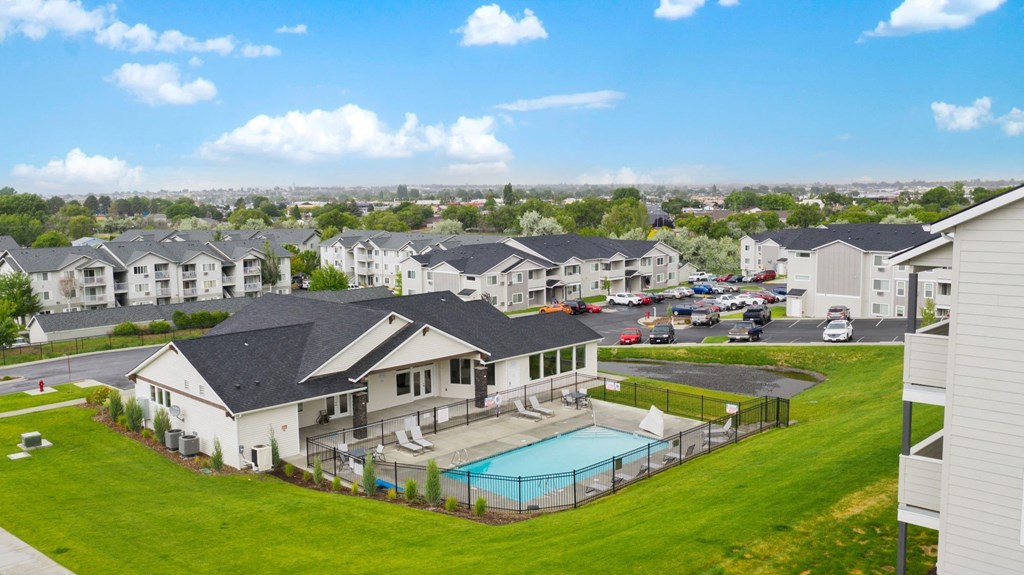 Pioneer Meadows Clubhouse with Pool and View of Property