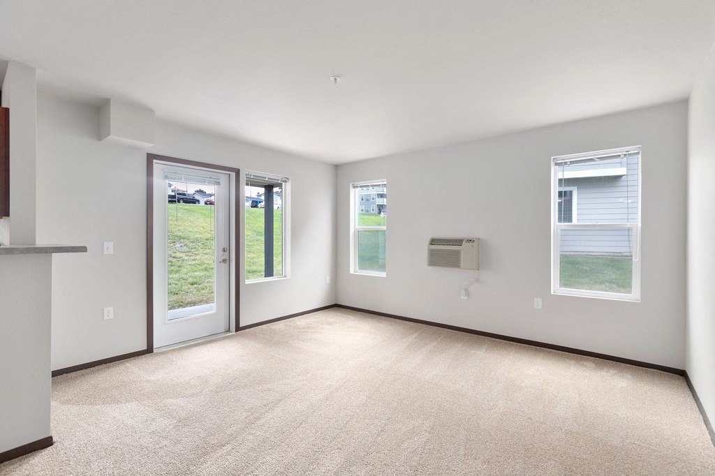 Pioneer Meadows Living Room with Private Patio