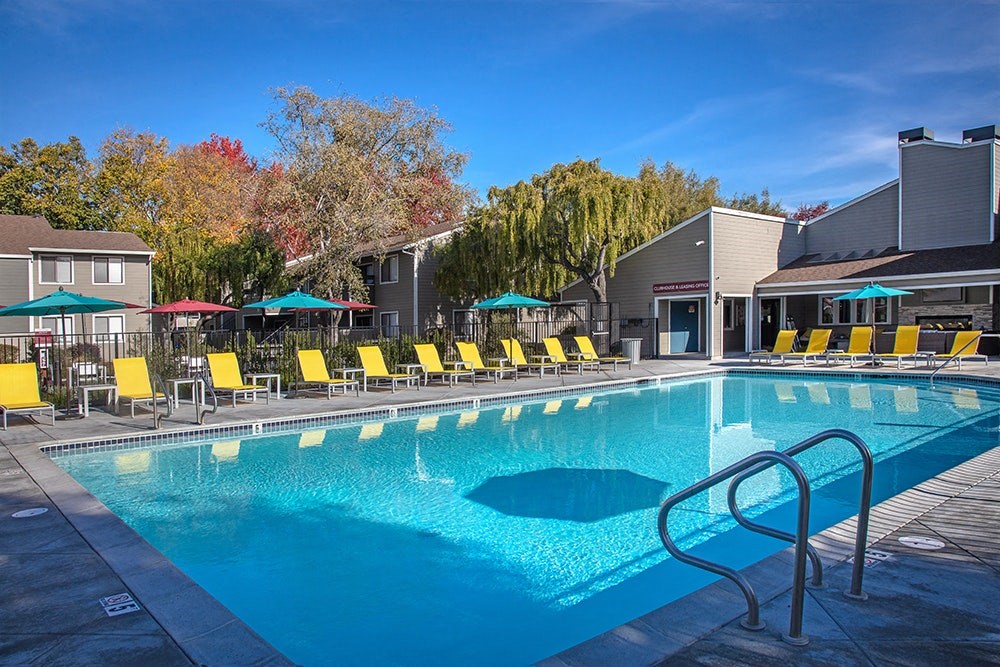 The Alexandar Pool with Lounge Chairs