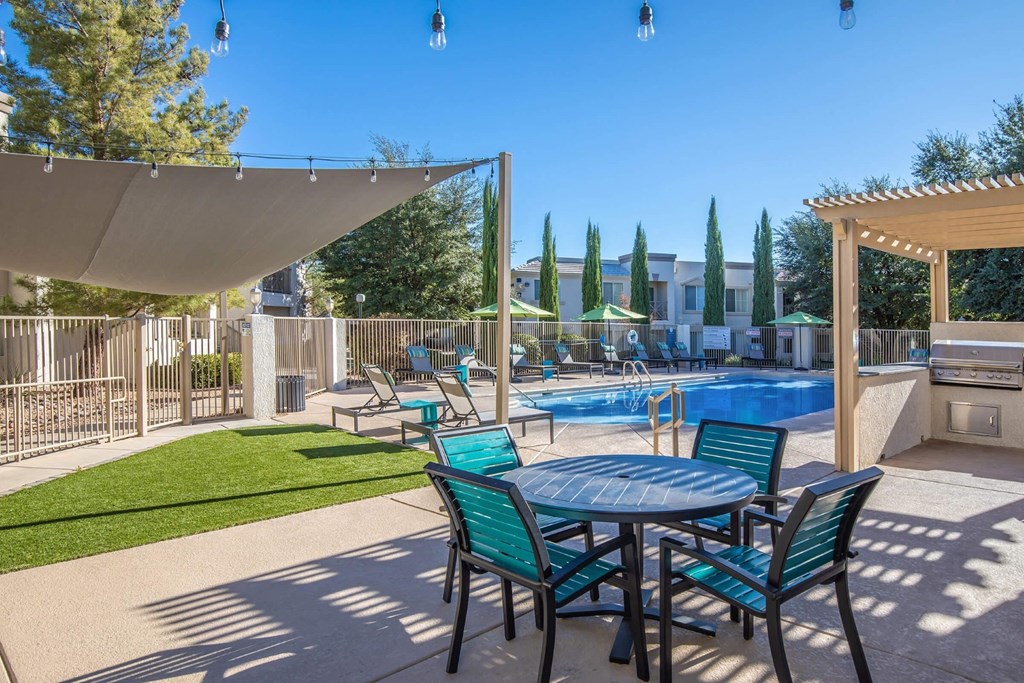 Port Royale Luxury Apartment Homes in Sierra Vista, Arizona Pool with Lounge Chairs and BBQ
