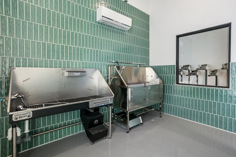 A stainless steel sink in a commercial kitchen.