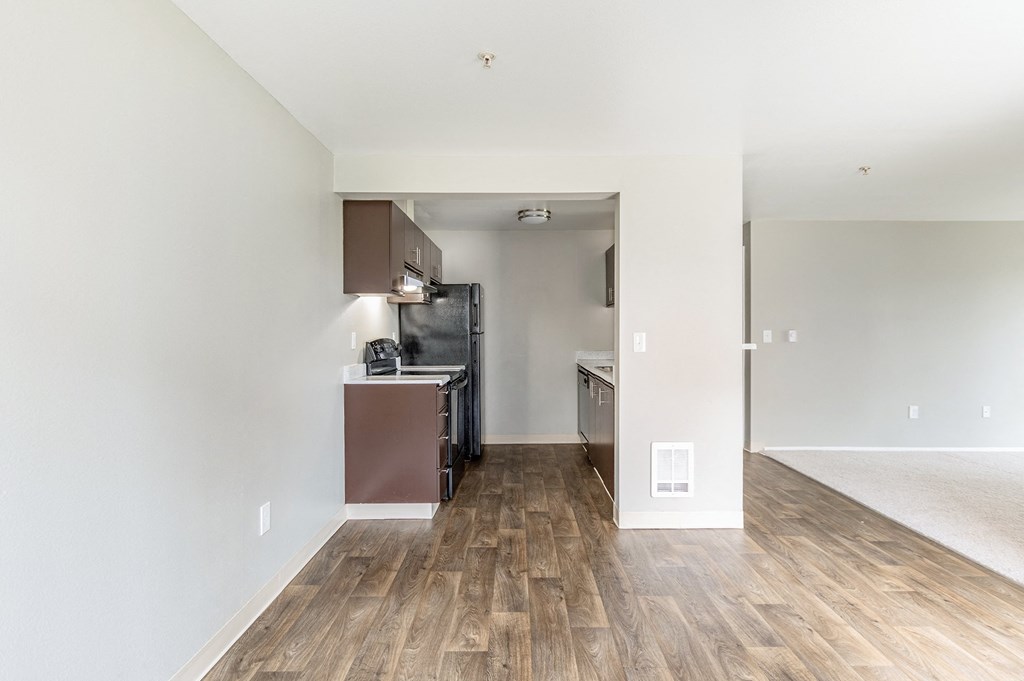 a kitchen and living room in a 555 waverly unit