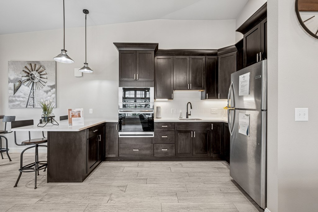 Remington Village Apartments in Gillette, Wyoming Clubhouse Lounge with Kitchen