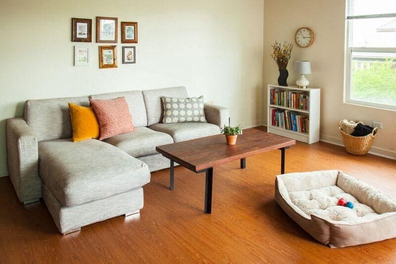 a living room with a couch and a coffee table