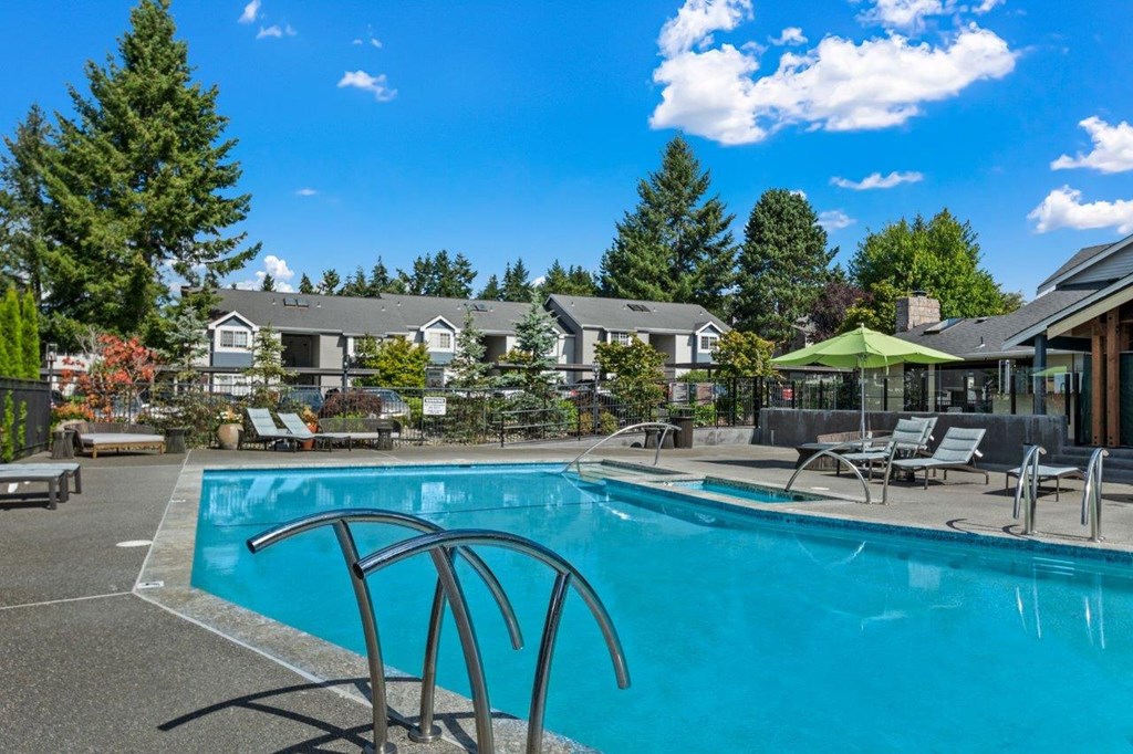 Ridgetop Apartments Pool with Lounge Chairs