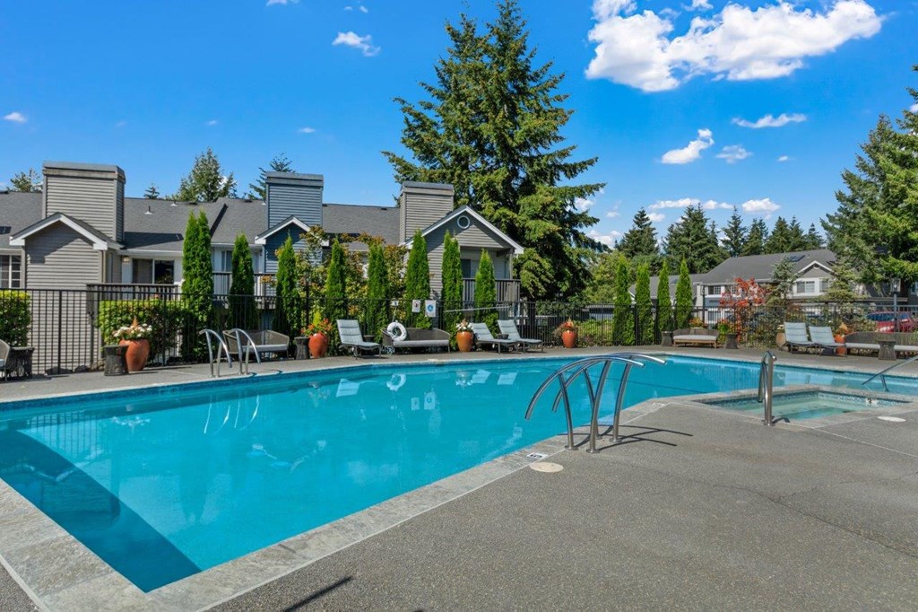Ridgetop Apartments Pool with Lounge Chairs
