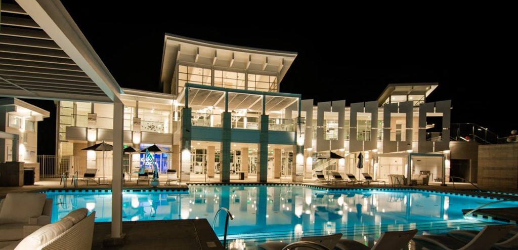 Rockpoint Apartments Pool Area and Building at Night