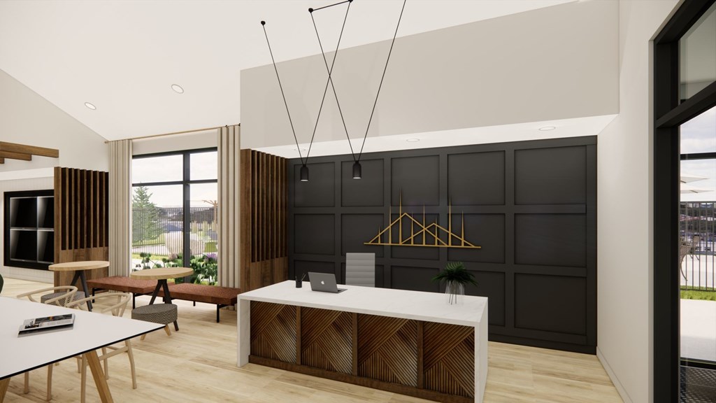 A modern office space with a white desk and a laptop on it.